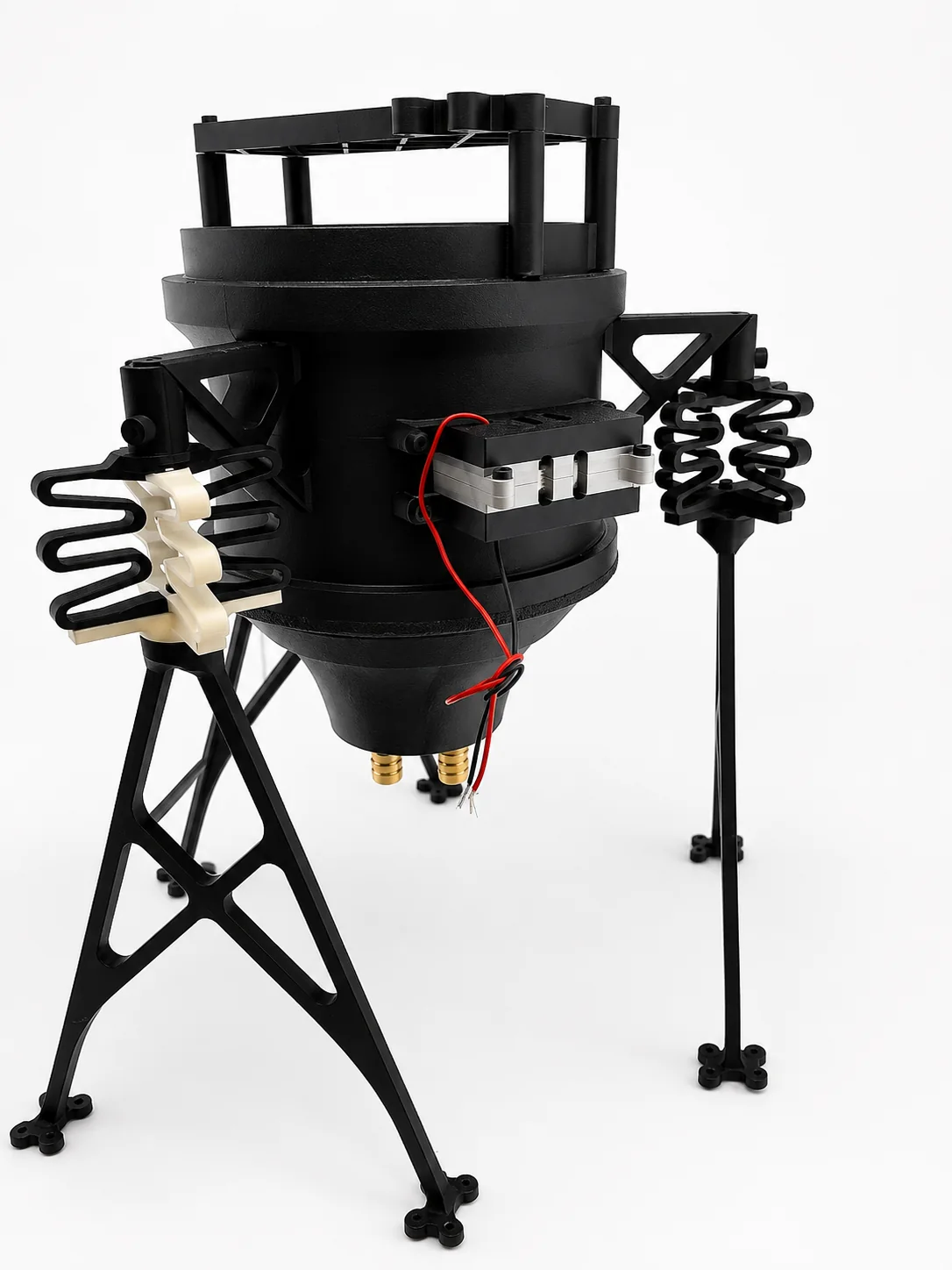 Large black prototype system with support frame, wiring, and connections