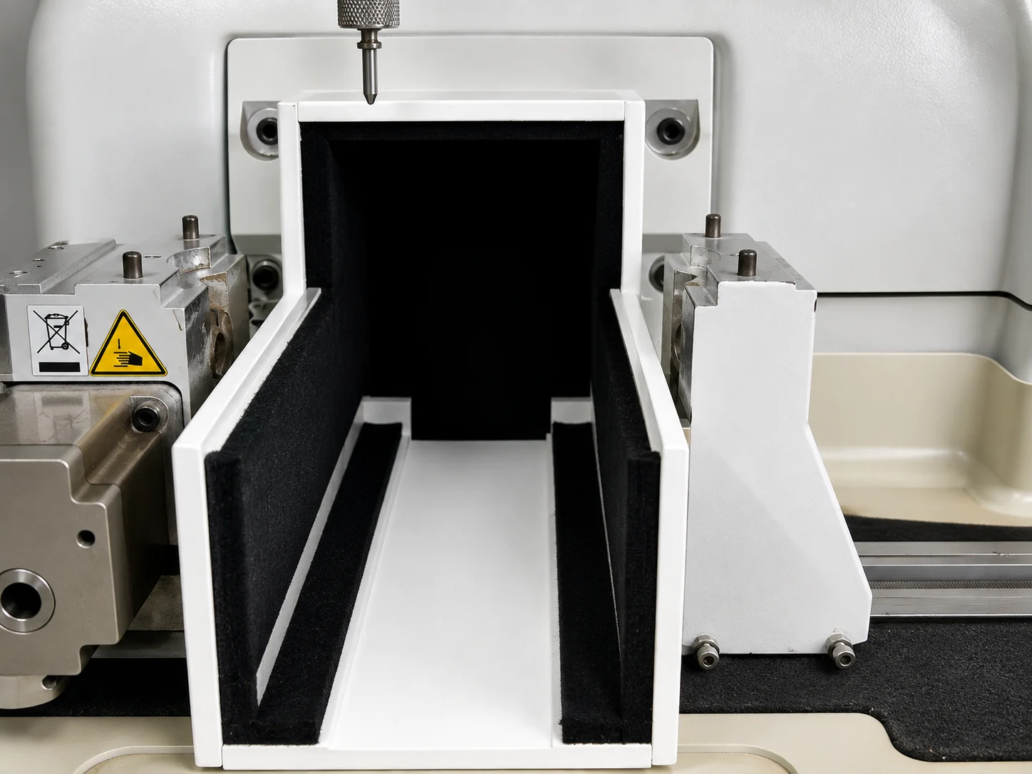 Custom fitted fixture designed around existing equipment and critical contact surfaces